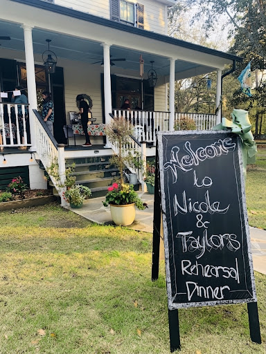 Welcome sign for rehearsal dinner at Porch ROCKIN on Johns Island